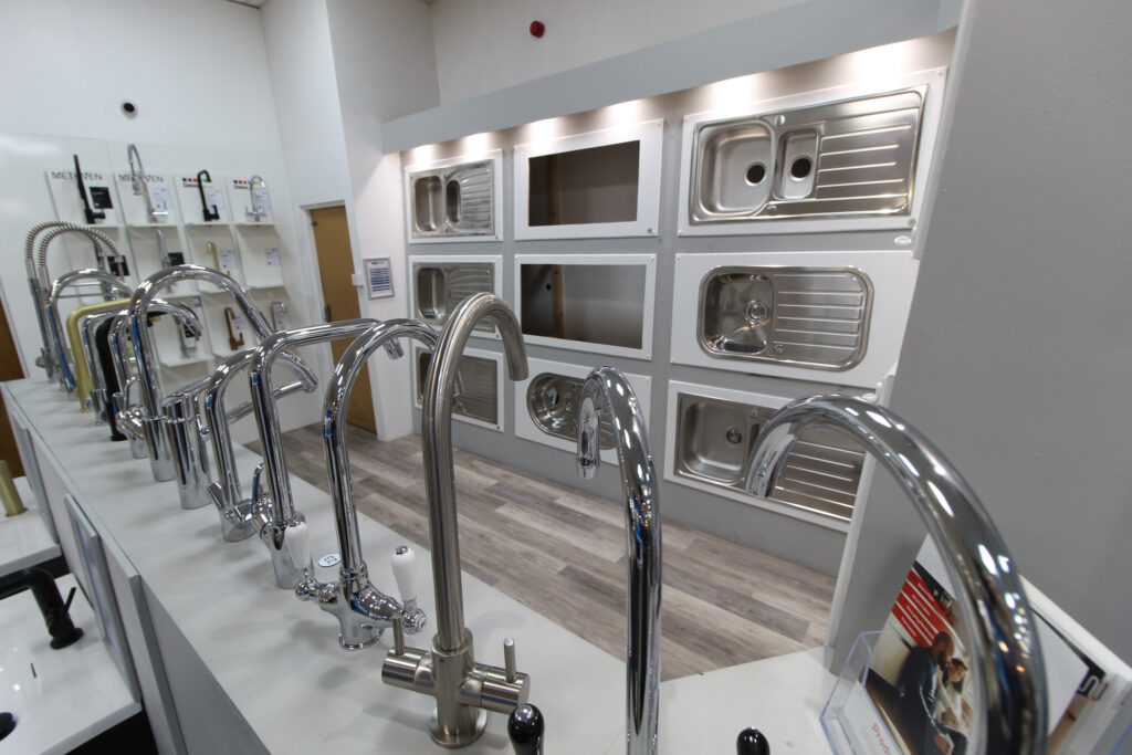 Kitchen sink and tap display at coventry plumbing
